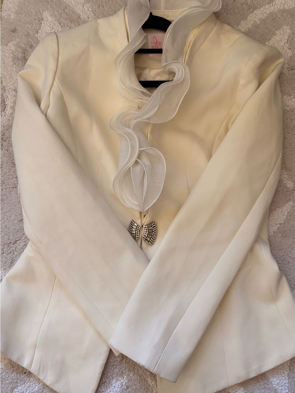 NWOT- Cream  Ruffled Lapel Blazer with rhinestone accent